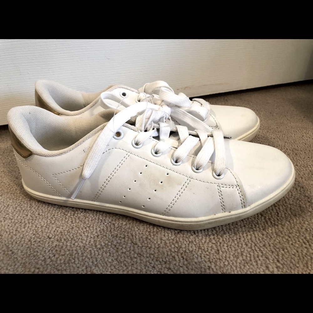 White and gold sneakers